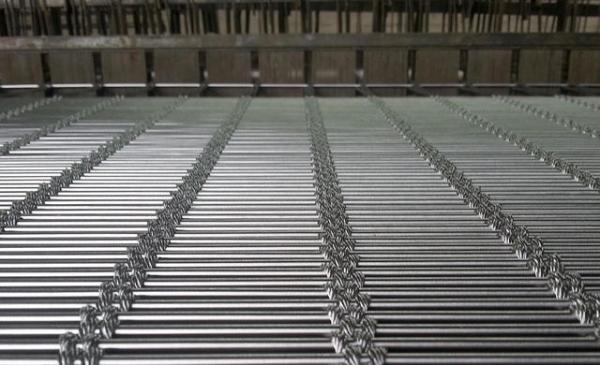 An architectural cable mesh production machine