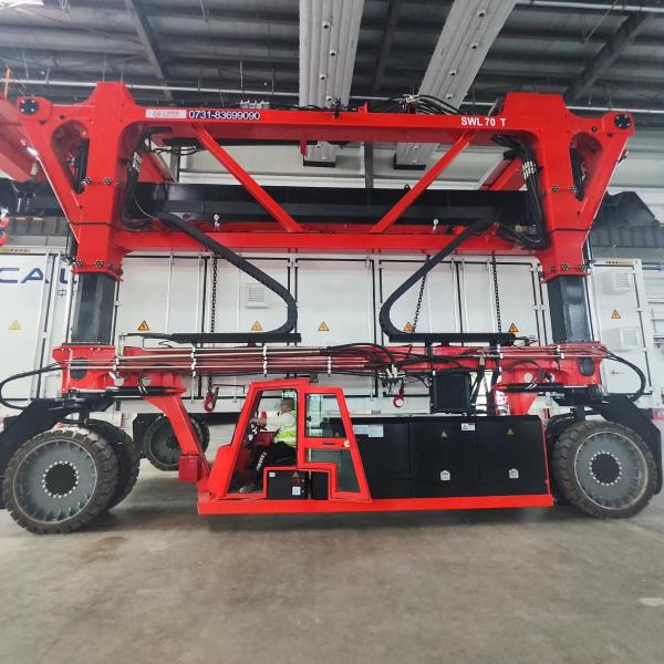Quality 70T Electric Straddle Carrier Red Container Lifting Vehicle For Oversized Heavy Loads for sale