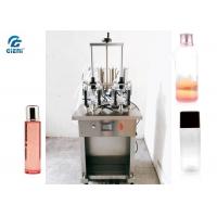 China Four Nozzles Toner Filling Machine For Glass Bottles , Electric Driven Type factory