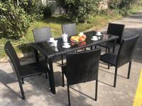 China Stackable Chair Outdoor Rattan Dining Set KD Tabke With Black Glass factory