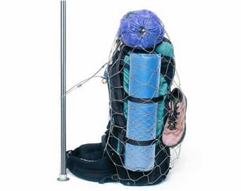 A bag is put into a backpack protector, which is fixed to a handrail to prevent the bag being stolen.