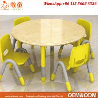 China Day Care Centre High Quality 4 Seats Round Wood Table and Plastic Chairs for 2-5 years old kids factory