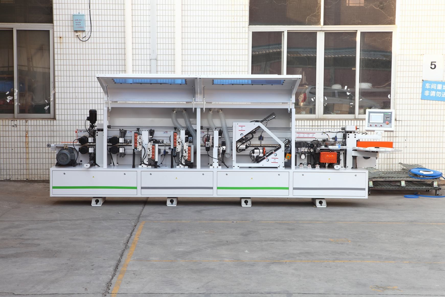 China Linear High Speed EVA Wood Edge Banding Machine Companies 16.54kw 23.3m Min for sale
