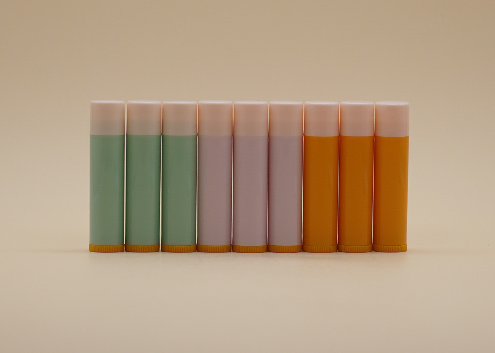 China Orange Green Pink Color Lip Balm Tubes Cosmetic Lipstick Case For Personal Care factory