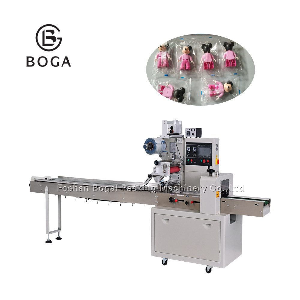 China Flow Wrap Packaging Machine Stationary Application Toys Packaging Engineer Provide factory