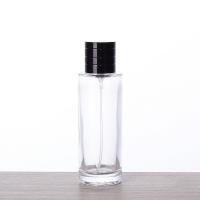 China 50ml Tall Cylindrical Glass Perfume Bottle Fine Spray Portable Cosmetics Bottle With Cap factory