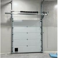 China Weather Sealed White Sectional Door With Security Lock Automated Safety Features factory