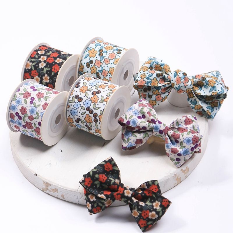 China Personalized Eco Friendly 25mm Branded Fabric Tape Roll OEM/ODM Service Printed Pattern Ribbon factory