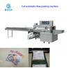 China High Speed Horizontal Flow Wrap Machine Multi Function Magazine Packaging factory