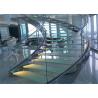 China Round Glass Modern Curved Staircase With Double U Channel Stringer factory