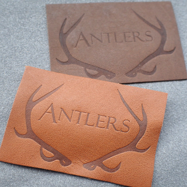 Quality Customized Hot Stamped Antique Copper Embossed Leather Patches for sale