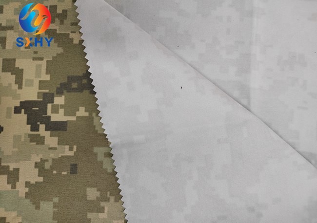 China TC 50/50 twill intumescent PU coated waterproof camouflage pixel fabric for uniform jacket factory