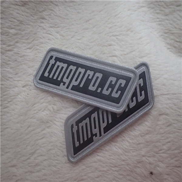 Quality Outdoor Men Clothing Reflective PU Leather Patches High Frequency Sewing Line for sale