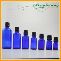 China Empty Blue Glass Essential Oil Bottles For Fragrance Oil With Black Caps factory