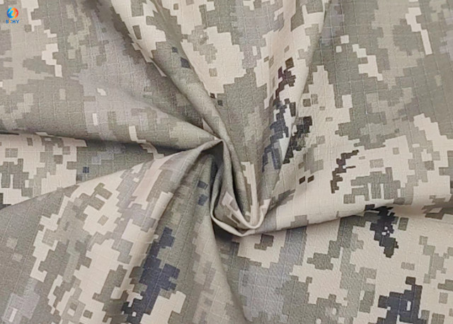 China Dyed Ground Printed CVC65/55 RIPSTOP Camouflage Print Fabric 14S*14S 84*52 Workwear factory