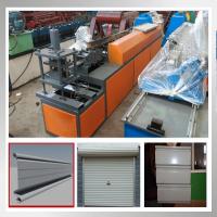 China Garage Steel Roller Door Frame Roll Forming Machine factory