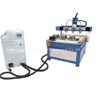 China 3 Heads 3 Rotary Axis Wood Metal Stone CNC Engraving Cutting Machine factory