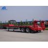 China 2 Axles Low Bed Semi Trailer 20-40 Tons Machine Loading Spring Steel Suspension factory