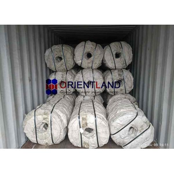 Quality 54-56 Loops Coiled Razor Barbed Wire With Steel Tape Sharp Edged Blades for sale