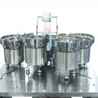 China Four Vibrator Bowl Automated Packaging Machine Four Tray Auto Packing Machine factory