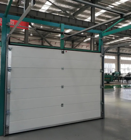 China Flat Or Contoured Panel Insulated Sectional Doors Industrial Warehouse Overhead Vertical Lifting factory