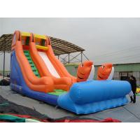 China Rotating Large Inflatable Slide With Inflatable Trampoline Jumping Bouncer for sale