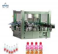 China Rotary Three Phase Hot Melt Glue Labeling Machine For PET Oval Round Bottles factory