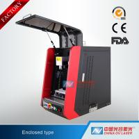 China Raycus IPG 20W 30W 50W Mini Enclosed Fiber Laser Marking Machine for Aluminum factory