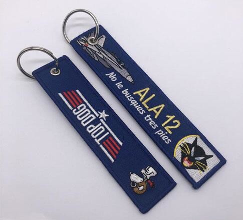 Quality Custom Embroidery Key Chains Printed Remove Before Flight Keychain for sale