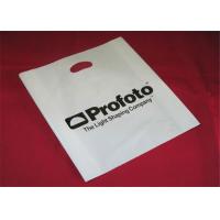 China LDPE Material Clothing Plastic Packaging Bags With Handle Custom Logo Printed for sale