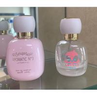 China Cute Pink 30ml 50ml Round Luxury Perfume Bottles With Pump Sprayer factory