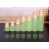 China 2oz Liquid Essence Bottle With Bamboo Lid Glass Dropper Bottle For Cosmetic Packaging factory