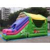 China Commercial backyard jungle theme kids inflatable jumping castle with slide made of best pvc tarpaulin factory