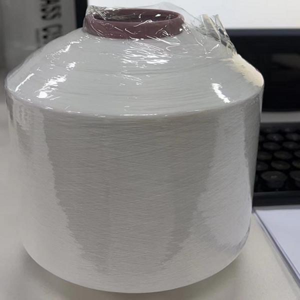 Quality Custom color white filament polyester dty 150/48 150D 48F big twist tubular logo yarn for woven ribbon label industries for sale