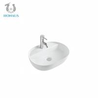 China Elegant Oval Bathroom Countertop Basin 1280 Degree Burned Ceramic Included 135mm factory