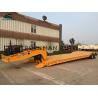 China 2 Axles Low Bed Semi Trailer 20-40 Tons Machine Loading Spring Steel Suspension factory