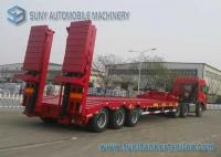 China 80 T Hydraulic Ladder 3 Axles Lowbed Semi Trailer , heavy duty flatbed trailer factory