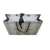 China Order Custom Printed Paper Merchandise Bag Business Packaging Online With Eyelet for sale