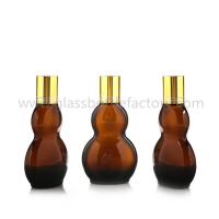 China 30ml and 50ml New Model Double Calabash Amber Essential Oil Bottles With Gold Caps factory