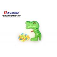 China Novelty Toy Candy Dinosaur Water Gun With Sweet Compress Candy For Children for sale