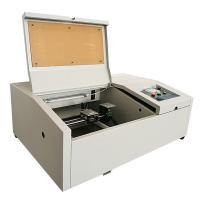 China Compact Small Laser Engraving Machine Miniature Laser Cutter Home Or Office Use factory