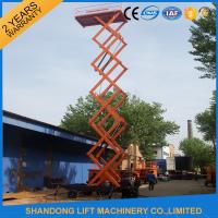 China 12m 500kg Mobile Scissor Lift Tables with Electric Hydraulic Motor Lift Drive factory