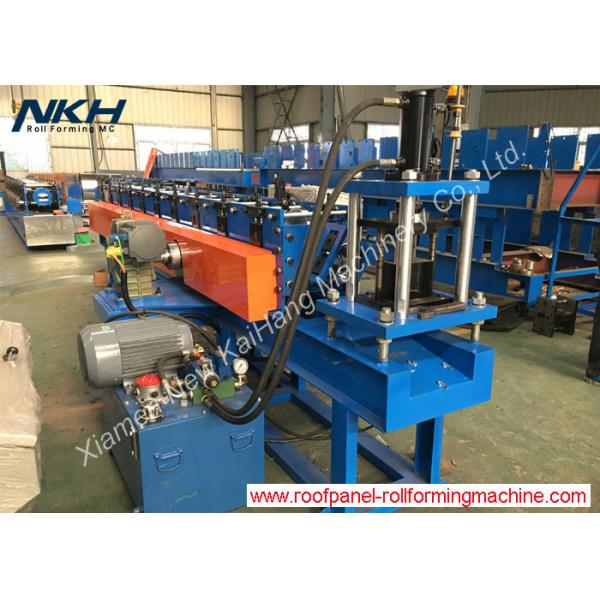 Quality Slotted angle roll forming machine with servo motor for Z purlin clip fastening for sale