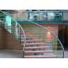 China Round Glass Modern Curved Staircase With Double U Channel Stringer factory