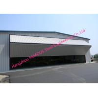 China Dual Panel Hydraulic Hangar Door Upper Folding Industrial Garage Doors With Hard Metal Sandwich Panel for sale