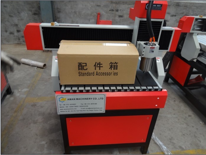 China Small 6090 wood cylinder engraving machine cnc router 4 axis for cylinder factory
