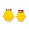 China Custom 230ml 350ml hexagon honey glass jar with Metal Lids and labels factory