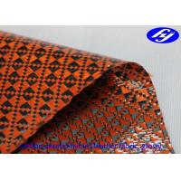 China Orange Polyurethane Leather Fabric Glossy Carbon Kevlar Hybrid For Sports Equipments factory