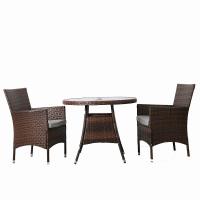 China Weatherproof Rattan Furniture Set Chair Round Glass Table for sale