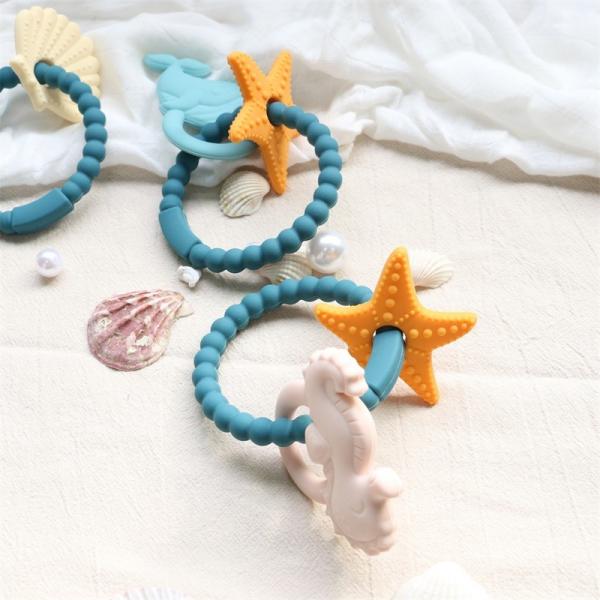 Quality Food Grade Silicone Baby Teether With Non - Toxic Design And Easy Grip Handle for sale